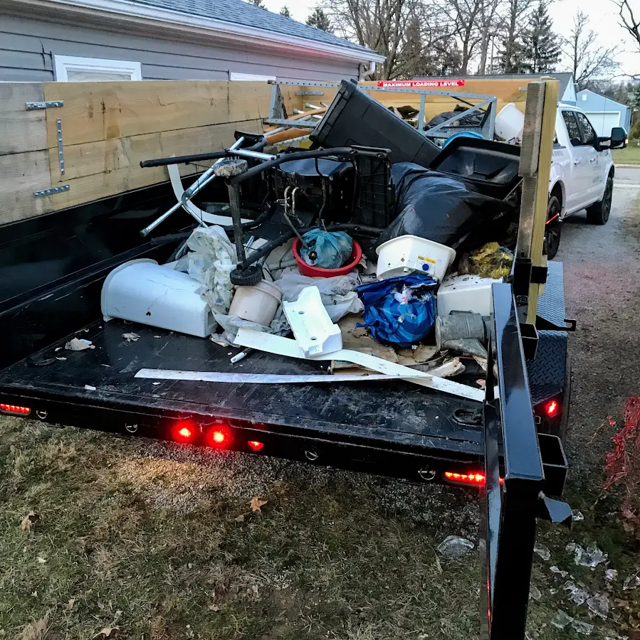 Roll-off dumpster delivered to a residential driveway in Lysander